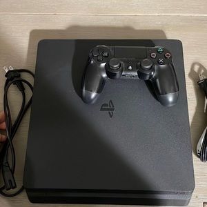 PlayStation 4 Slim 1TB with controller and cable. Price is negotiable. DM ME